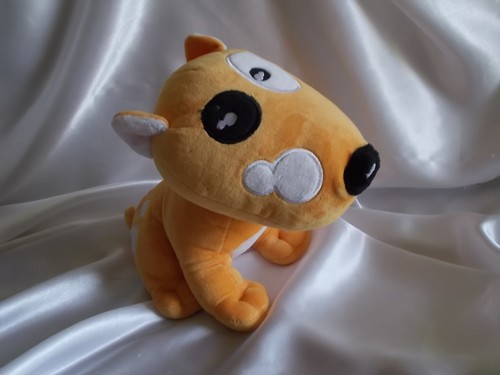 Doudou chien orange - ,, crédit
